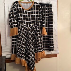 Mustard, black, and white outfit